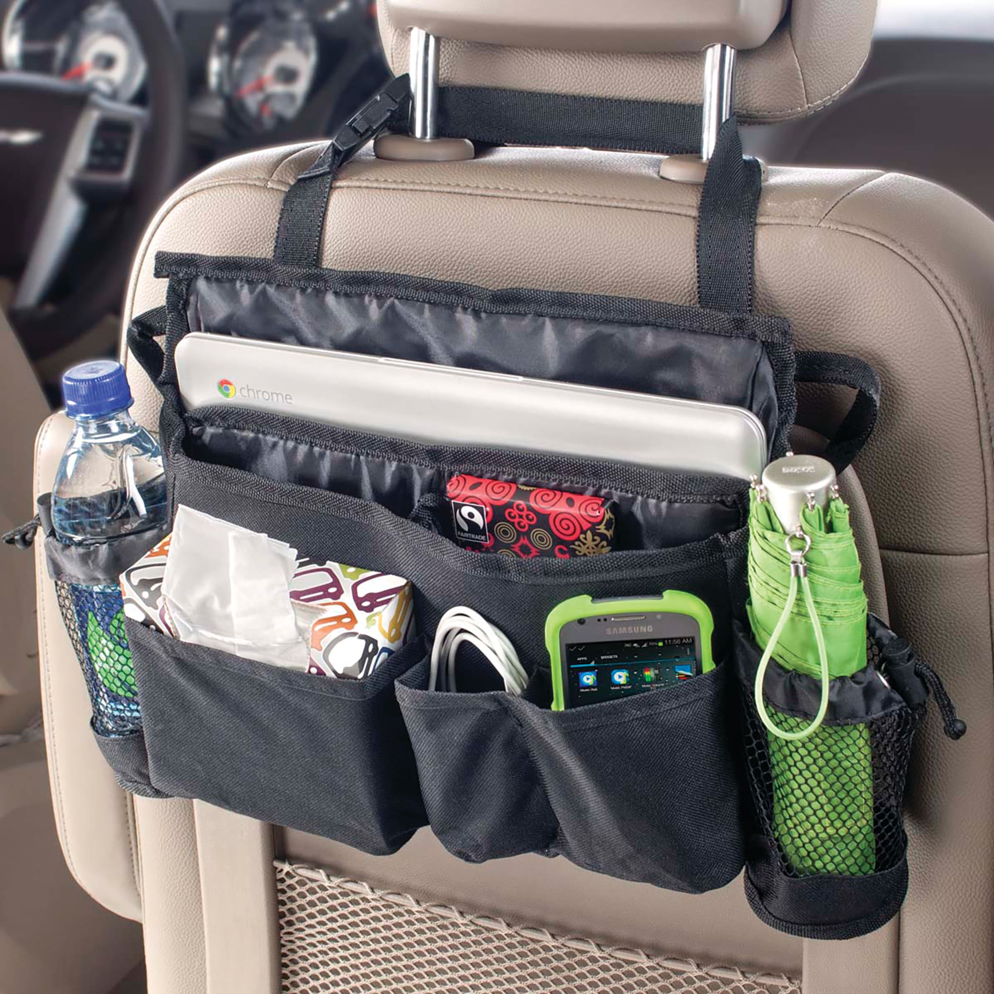 Seat back organizer holding everyday travel essentials inside a vehicle